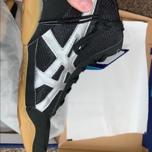 New,and still in box ASICS wrestling shoes.